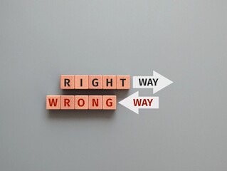 wooden cube with the words Right Way and  Wrong Way. 