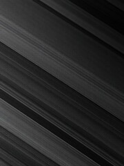 Obraz premium Abstract black carbon fiber background with diagonal lines and sleek texture, industrial, abstract