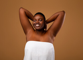 Portrait Of Happy Chubby Black Female Posing With Hands Up, Showing Her Smooth Armpits, Cheerful...