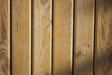 A natural wooden plank wall texture suitable for various backgrounds and design uses