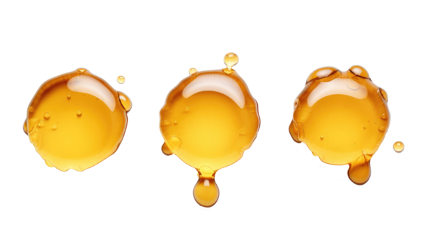three Honey droplets on transparent background