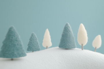 Paisagem natalina em miniatura com Papai Noel, renas e pinheiros cobertos de neve, estilo lúdico e colorido, criado por IA generativa.