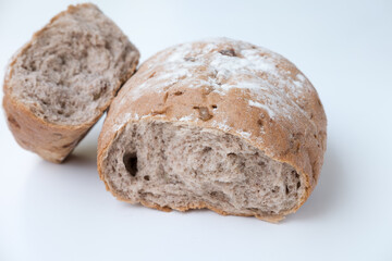 brown grain rye bread isolated on a white background