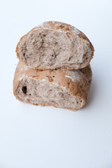 Obraz premium brown grain rye bread isolated on a white background