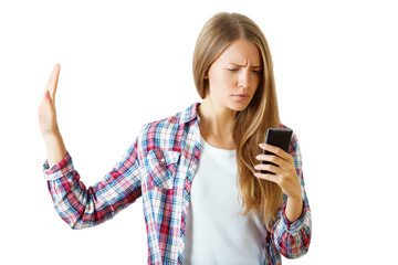 Woman in plaid shirt holding up a hand in a stop gesture while looking at a phone, isolated on white background, concept of disapproval
