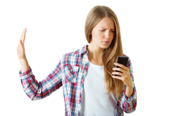Woman in plaid shirt holding up a hand in a stop gesture while looking at a phone, isolated on white background, concept of disapproval