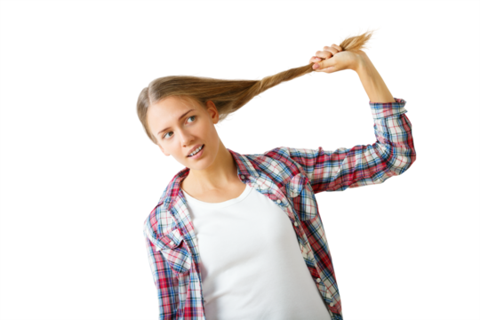 Woman in plaid shirt pulling her hair, isolated on white background. Concept of playfulness and casual style