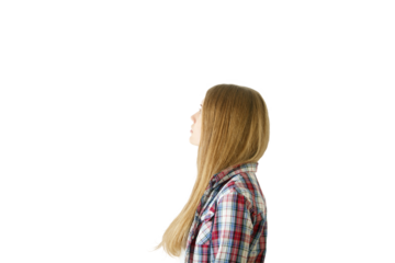 Woman in profile with long hair wearing a plaid shirt, isolated on white background. Concept of contemplation and simplicity