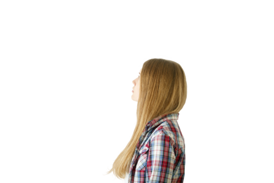 Woman in profile with long hair wearing a plaid shirt, isolated on white background. Concept of contemplation and simplicity