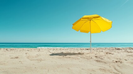 Yellow Beach Umbrella on Sandy Beach with Ocean View