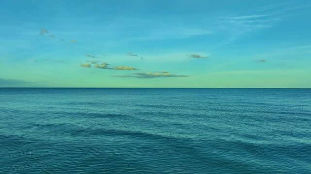 Nature of the beach and sea Summer with sunshine, sandy beaches, clear blue waters sparkling against the blue sky. On an island with good ecology and environment Background for summer vacation concept