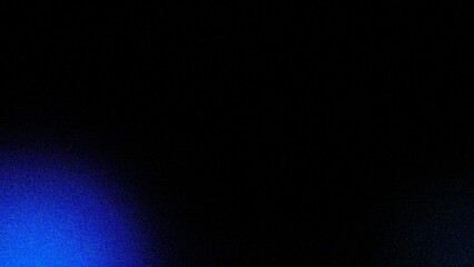 Obraz premium Black background with lines in light blue and dark blue,creating an abstract gradient effect.