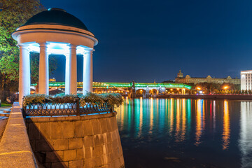 Pushkinskiy bridge with night illumination. Bridge to Gorky Park.