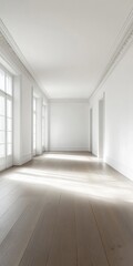 Obraz premium A long hallway with white walls and wooden floors. The hallway is empty and has a very clean and minimalist look