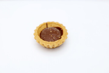 Tart chocolate isolated on white, selective focus on subject