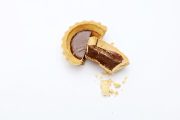 Tart chocolate isolated on white, selective focus on subject