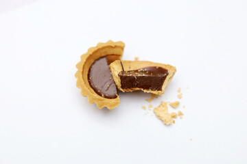 Tart chocolate isolated on white, selective focus on subject