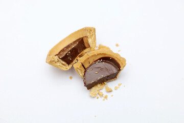 Tart chocolate isolated on white, selective focus on subject