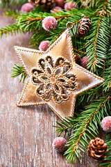 Christmas decoration on rustic wooden background. Close up.