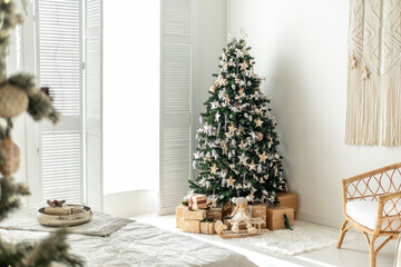 Cozy winter morning with a decorated Christmas tree in a serene living room
