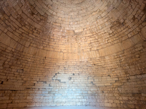 Interior of Clytemnestra Tomb at the Mycenae archaeological site, Greece. Mycenaean stone tholos roof indoor