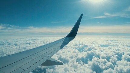 Fototapeta premium Aerial View of Clouds from Airplane Window
