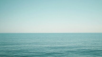 Fototapeta premium Calm Ocean View with Clear Blue Sky and Serenity
