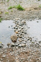 Natural Rock Overpass in River: Rustic River Crossing
