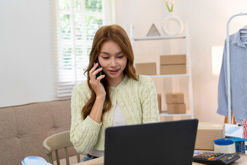 A fashionable woman wearing beautiful attire stands beside a mannequin adorned with trendy clothes...
