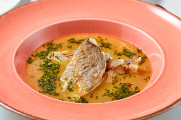 Vibrant Rustic Fish Soup with Space for Text