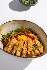 Elegant Viennese Schnitzel with Vegetables and Potatoes in Vibrant Light