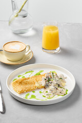 Culinary Elegance Mushroom Omelette with Cream Sauce in Minimalist Composition