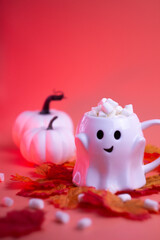 Ghost mug filled with marshmallows.