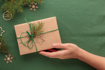 Christmas gift in zero waste eco-friendly pack with hand
