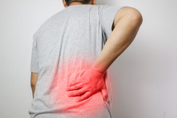 Health care and problem concept - Close-up of an Asian man suffering from back pain.
