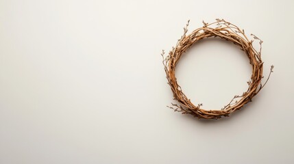 Copy space surrounding a remembrance wreath in a minimalist design.