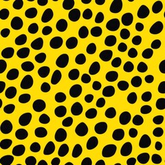 seamless pattern of overlapping bold black dots on a bright yellow backdrop