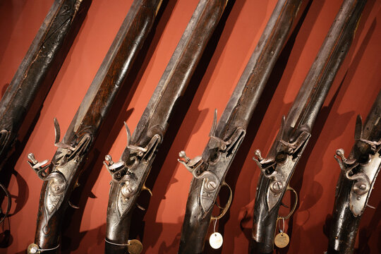 Valletta, Malta - Grandmaster Palace hosts an exposition of historic rifles. Antique firearms and military artifacts showcased
