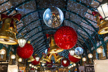 Christmas lights in Apple Market Covent Garden in London, UK © Delphotostock