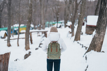 Woman tourist with snow in winter season at Zao fox village, traveler sightseeing Miyagi prefecture. landmark and popular for attraction near Sendai, Tohoku, Japan. Travel and Vacation