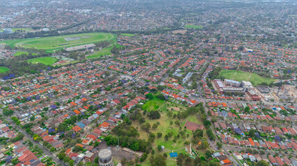 Obraz premium defaultPanoramic aerial drone view of Western Sydney Suburbs with Houses roads and parks in Sydney NSW Australia