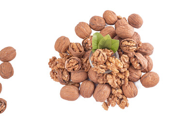 A White Bowl Filled with Shelled Walnuts