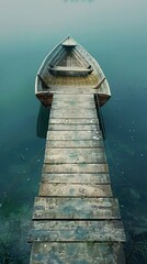 Fototapeta premium Tranquil Wooden Boat Docked on a Misty Lake