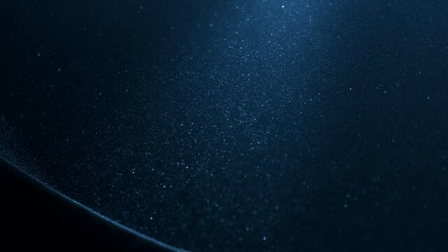 Little grains of dust glitter particles flowing in slow motion. 