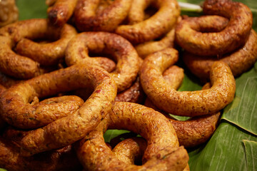 Fototapeta premium Pork sausages in a street food market, Close-up of Northern Thai pork sausage