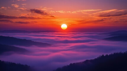 Sunset Over Foggy Mountains with Silhouetted Trees