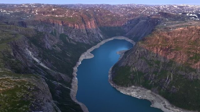 Norway's Breathtaking Ringedalsvatnet Lake where Troll Tongue or Trolltunga is located. Aerial Drone Shot over a Fjord