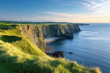 Obraz premium A beautiful view of the ocean with a cliff in the background