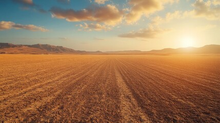 Fototapeta premium Desert Landscape with Mountains and a Sunset Sky