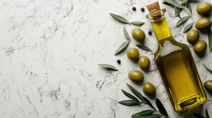 Green olives alongside a bottle of olive oil with a blank area available for text